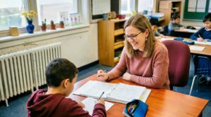 teacher, pupil, classroom, learning, education, school, to study, extra lesson, elementary school, math, help, accompaniment, focus, young, children, happy, smile, support, academic, lesson, ai generated